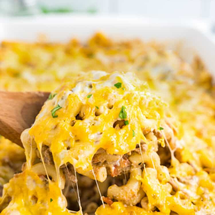 Cheeseburger Casserole Recipe in Baking Dish with Wooden Spoon Scooping