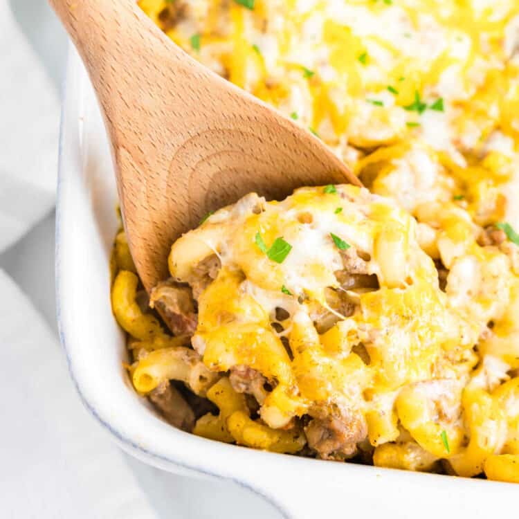 Cheeseburger Casserole Recipe in Baking Dish with Wooden Spoon Scooping