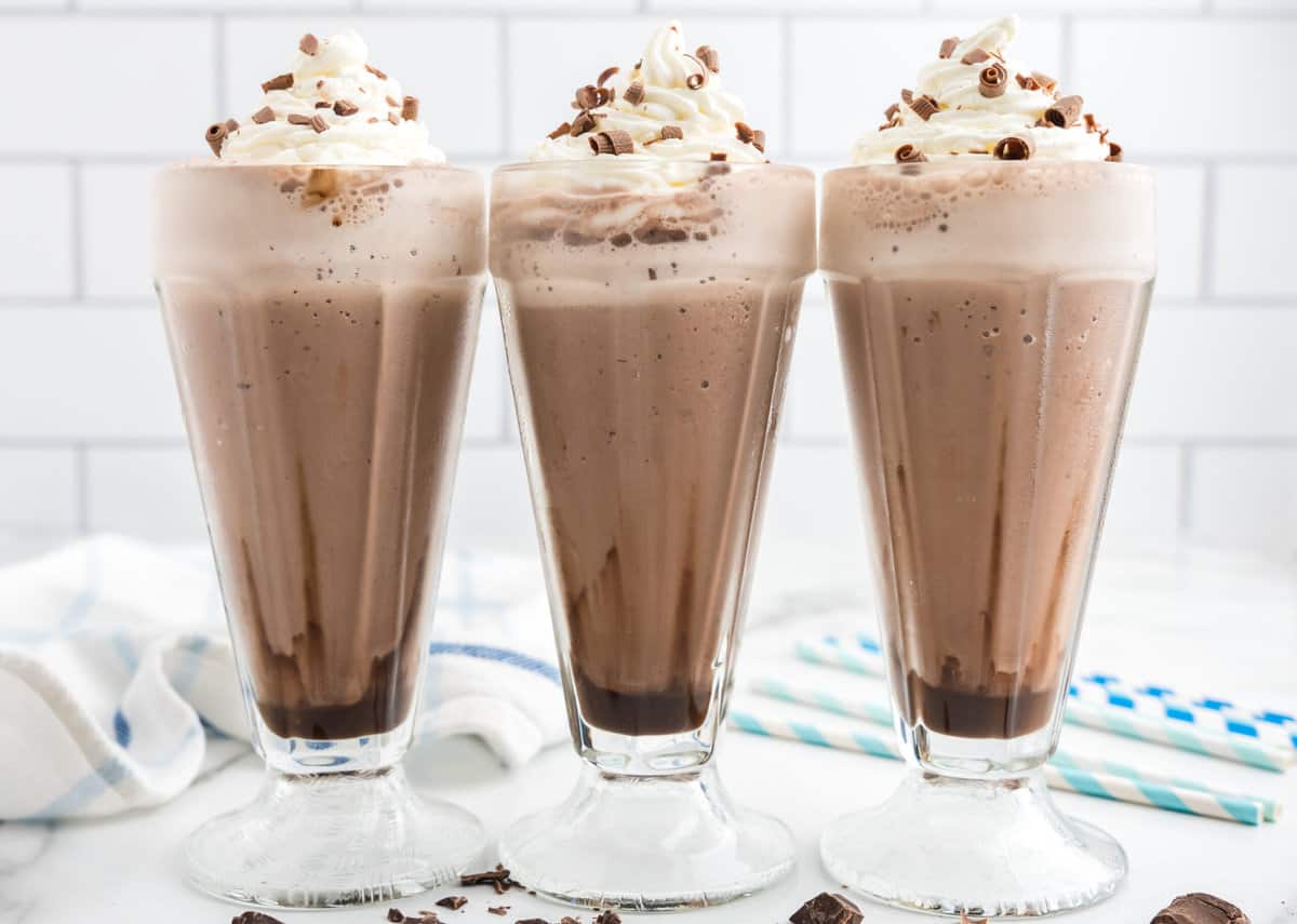Three Frozen Hot Chocolate Drinks in a line.