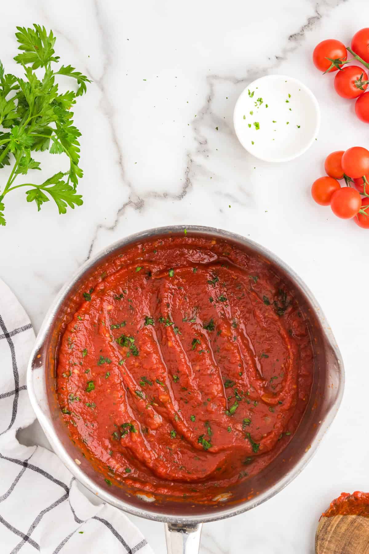 Homemade Marinara combined in stovetop pot