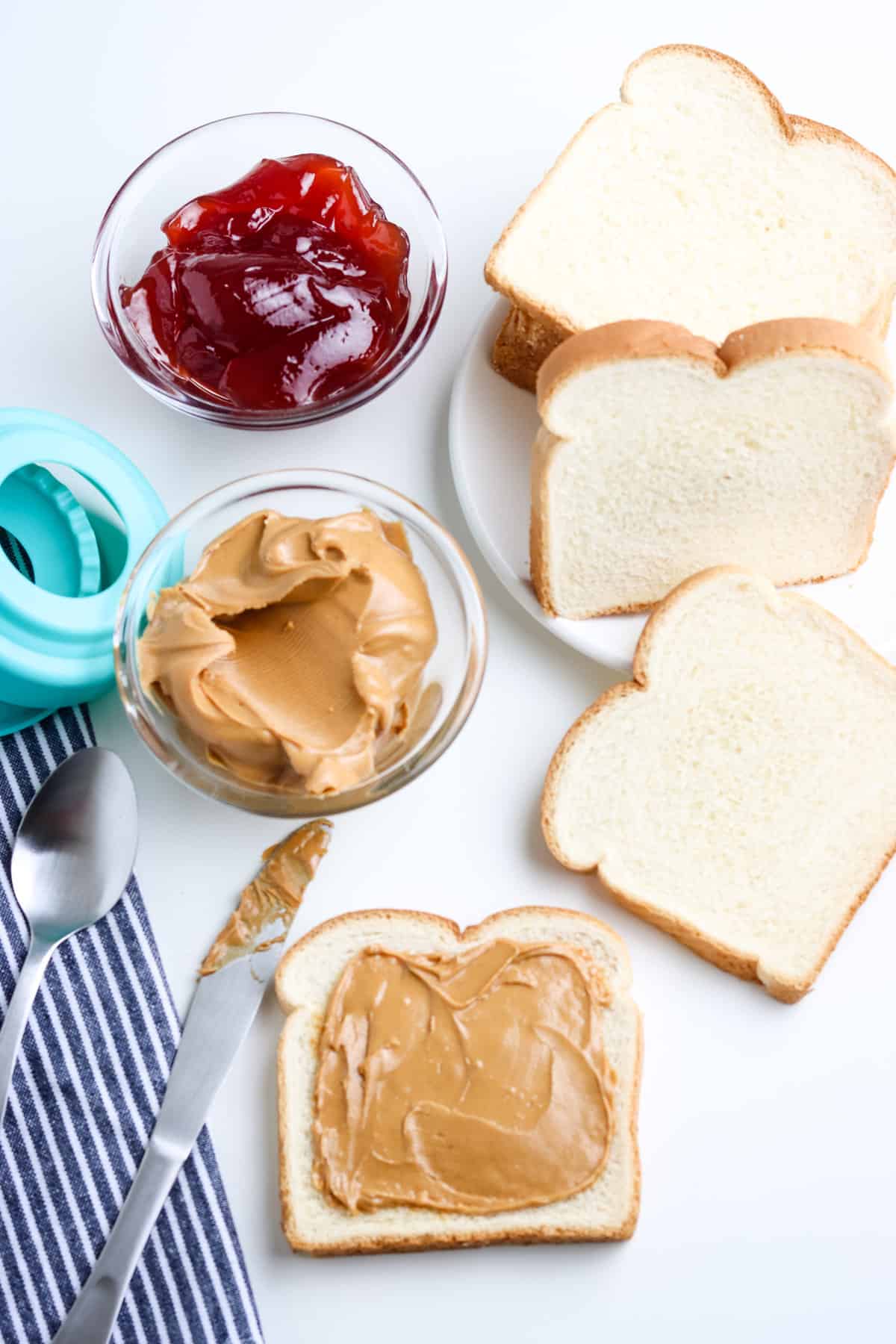 Spread Peanut Butter on One Slice of Bread