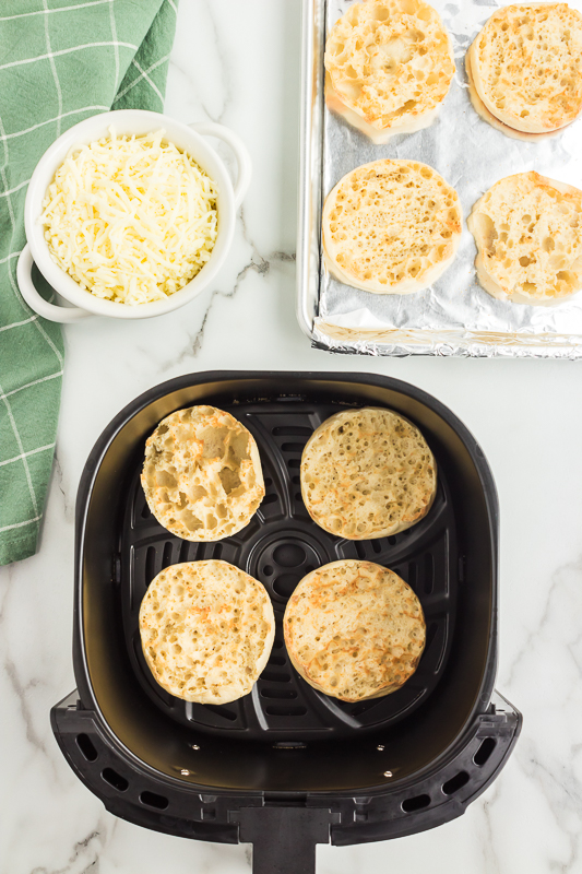 Place the English muffin in the air fryer and bake for 3 minutes.