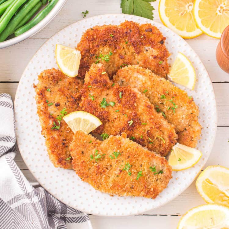 Pork Schnitzel on Plate with Lemon Wedges