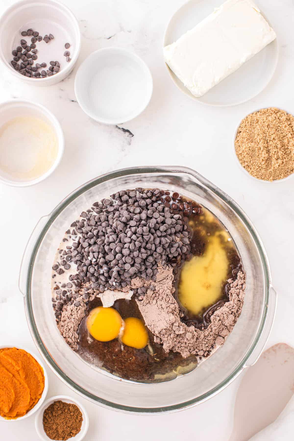 Preparing brownie mix in bowl for Pumpkin Brownies Recipe