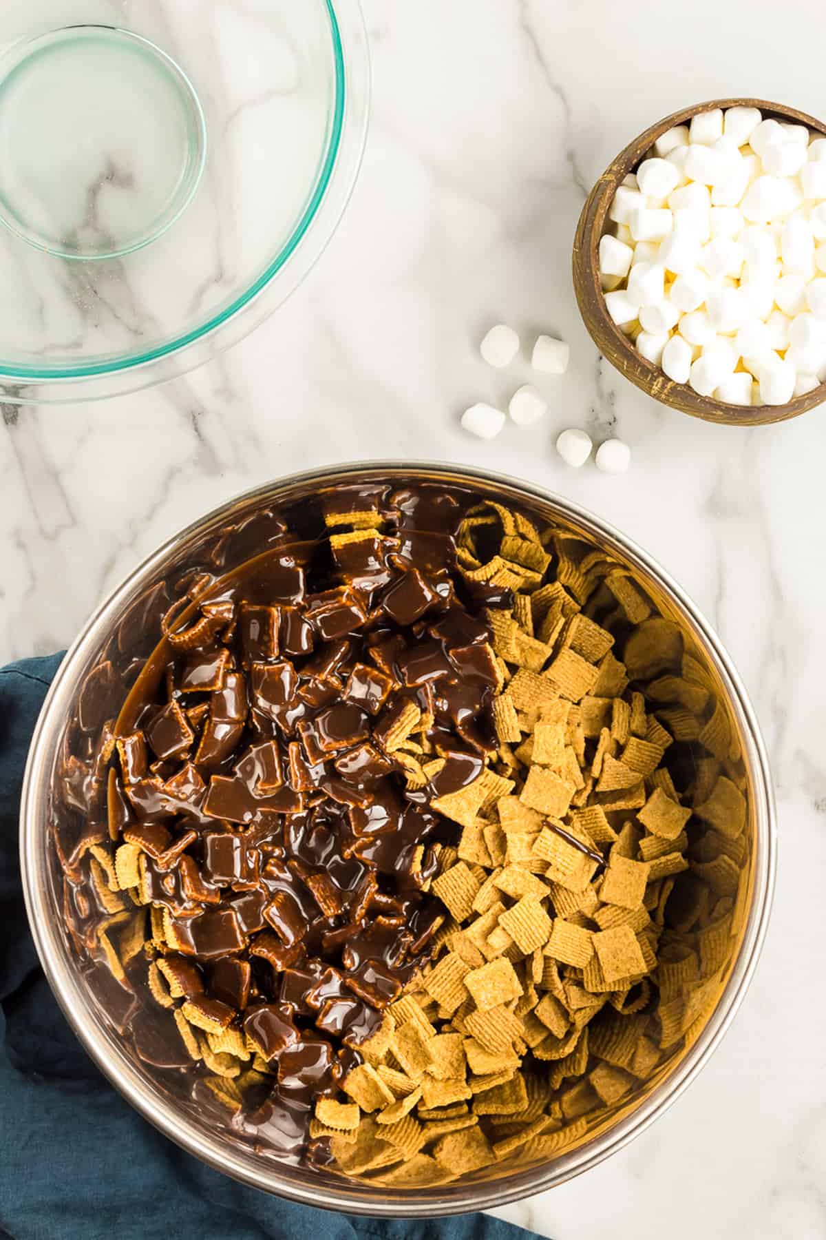 Pour the Cereal into a big bowl and pour the chocolate on top and mix together.