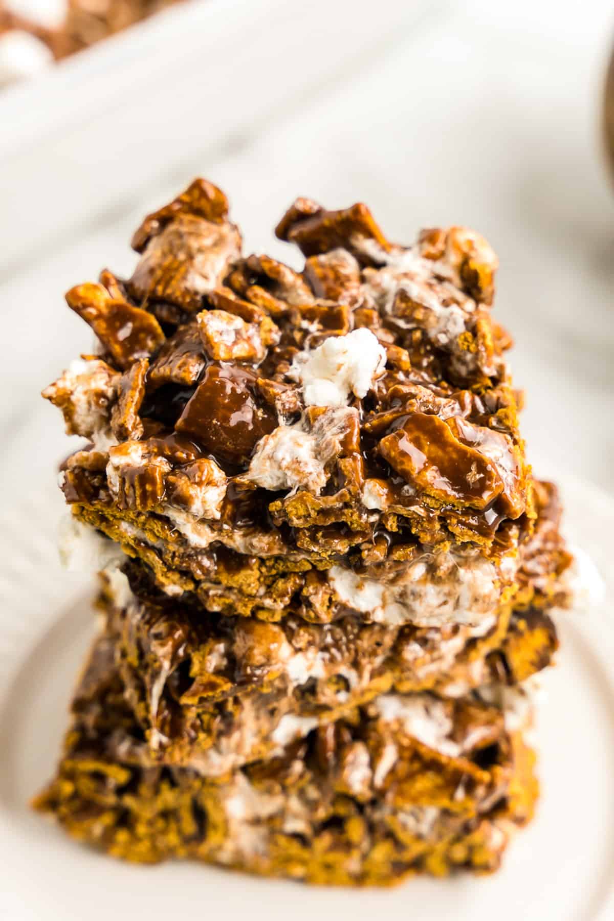 Close Up Photo of Three S'mores Bars stacked on top of one another.