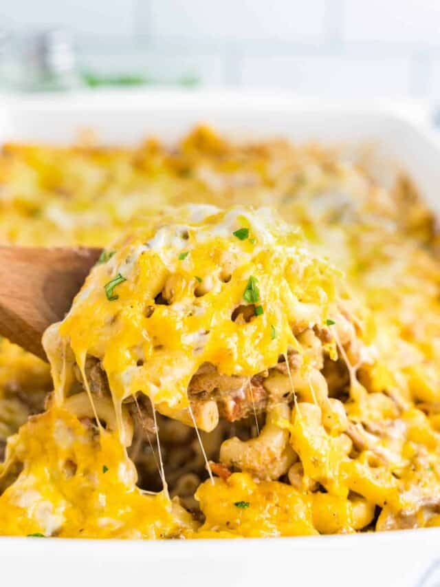 Cheeseburger Casserole Recipe in Baking Dish with Wooden Spoon Scooping