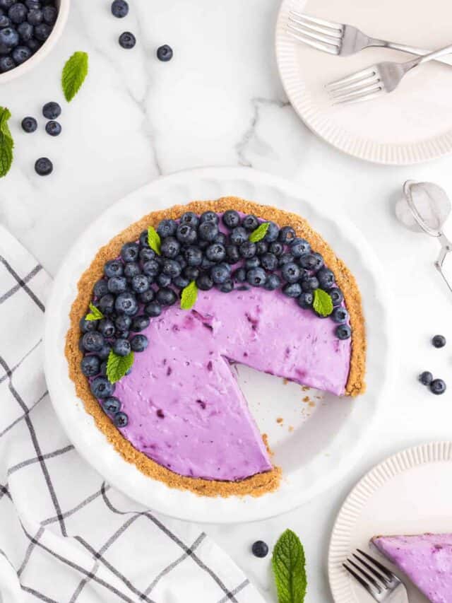 No Bake Blueberry Cheesecake with one cut slice