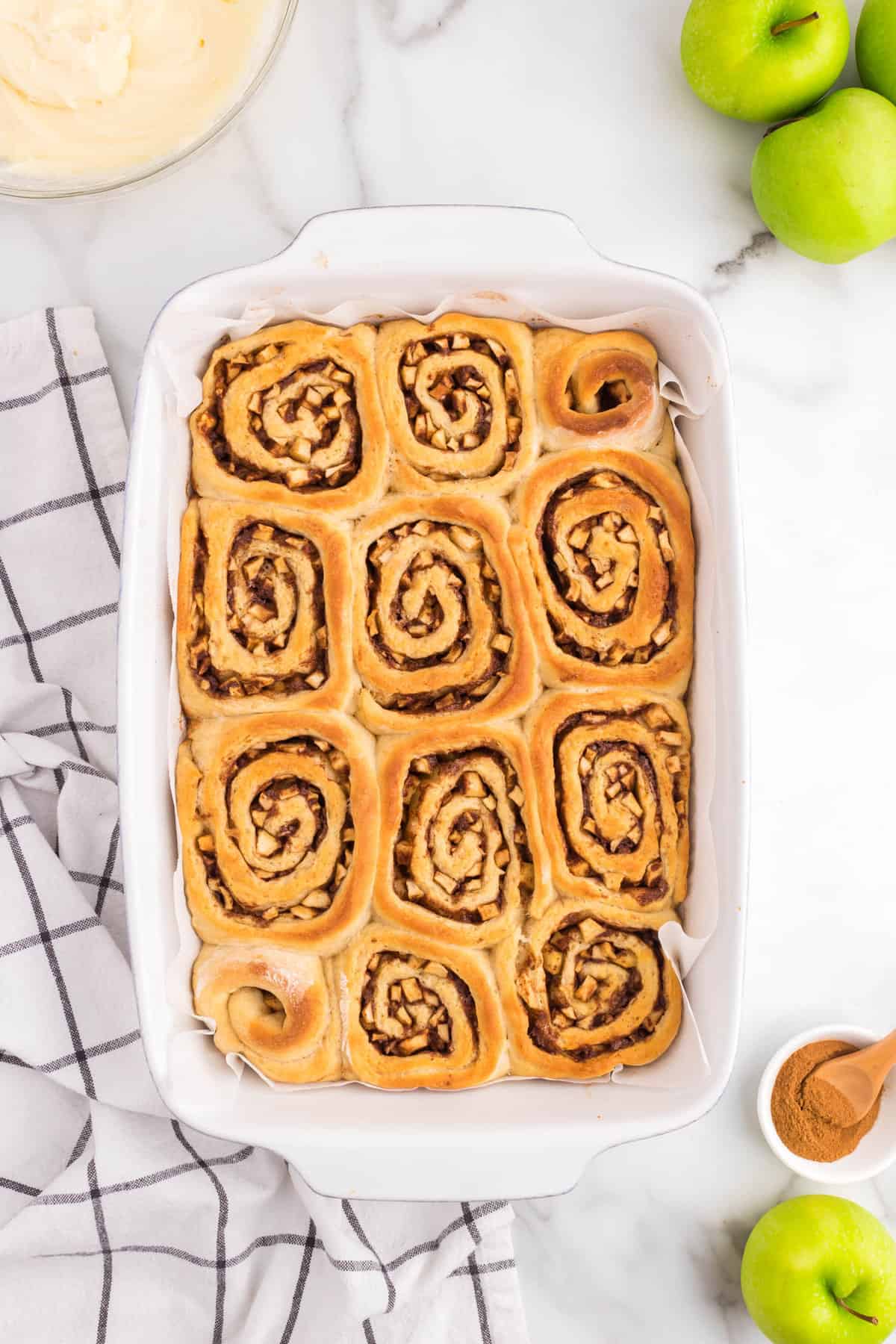 Apple Cinnamon Rolls baked to golden brown in baking dish