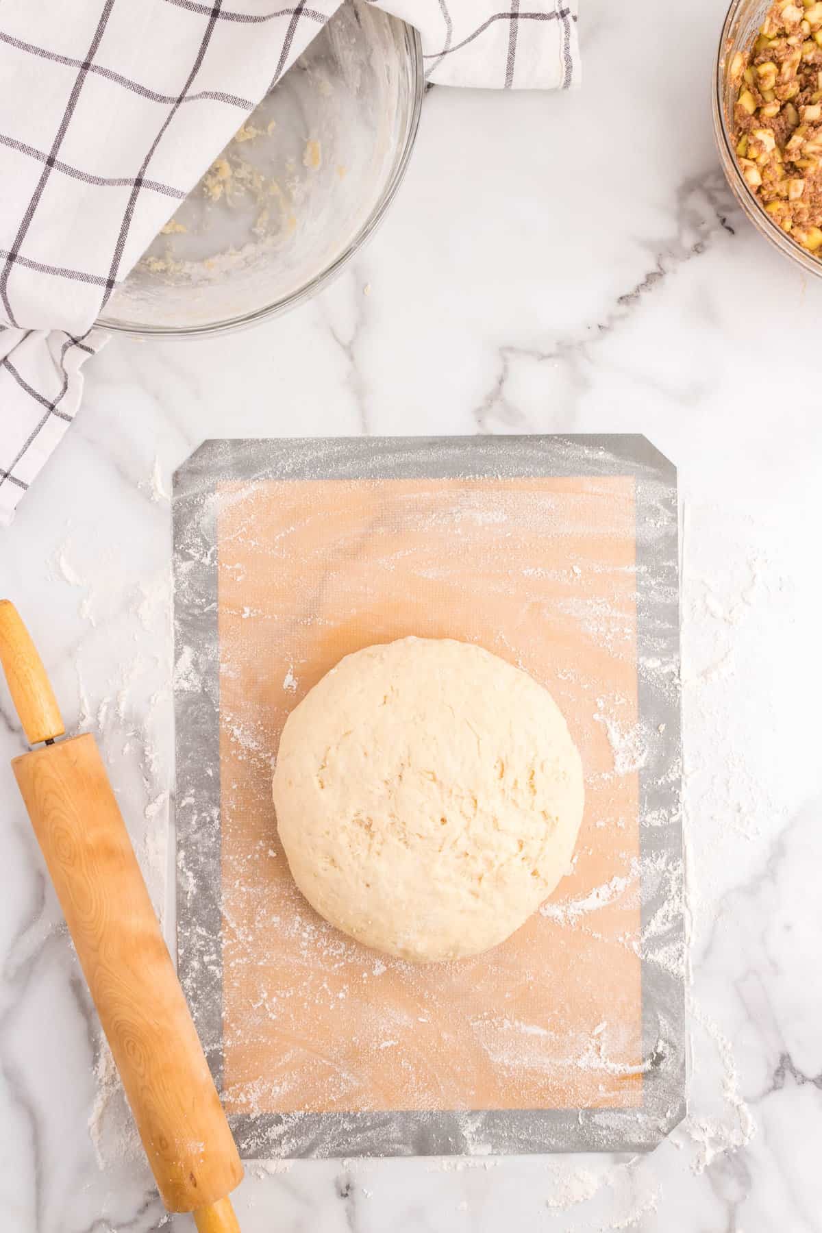 Proofing Apple Cinnamon Rolls dough on baking sheeting