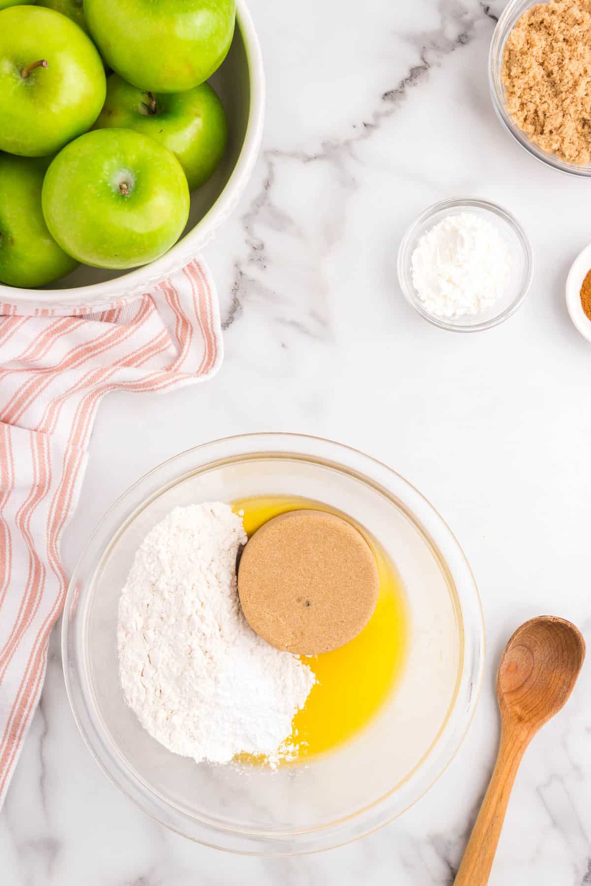 Mixing together ingredients in mixing bowl for Apple Crumble topping