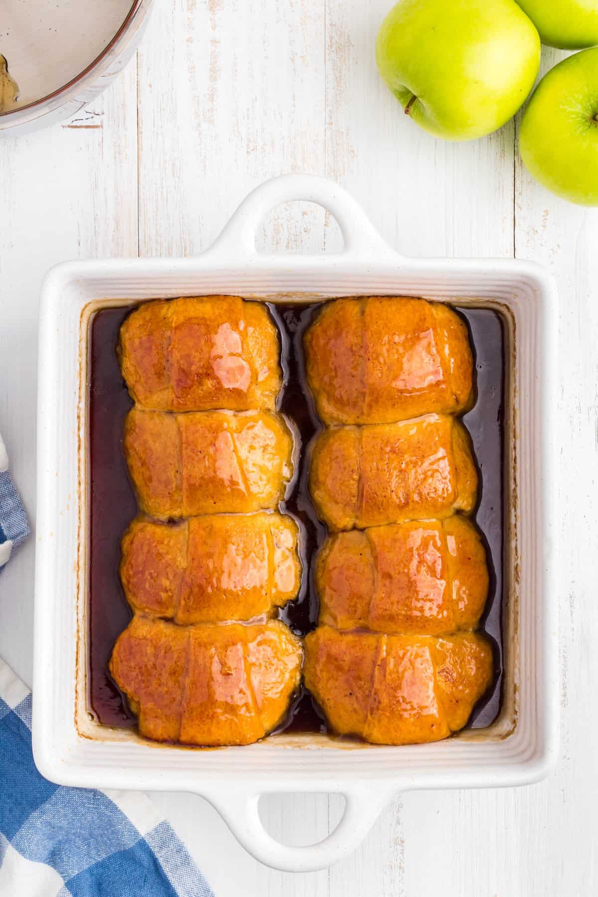 Apple Dumplings in baking dish baked to a golden brown 