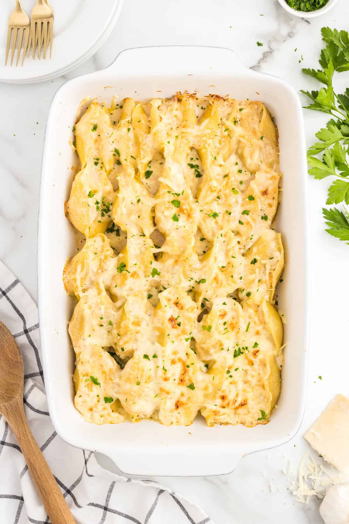 Chicken Alfredo Stuffed Shells in 9x13 baking dish hot out of the oven