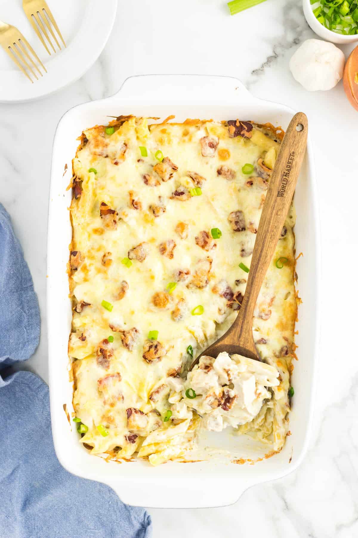 Chicken Bacon Ranch Casserole hot out of the oven with a scoop