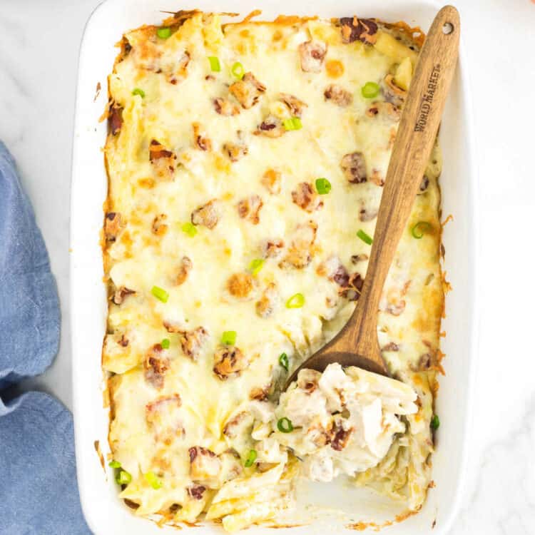 Chicken Bacon Ranch Pasta Bake in Baking Dish with Wooden Spoon