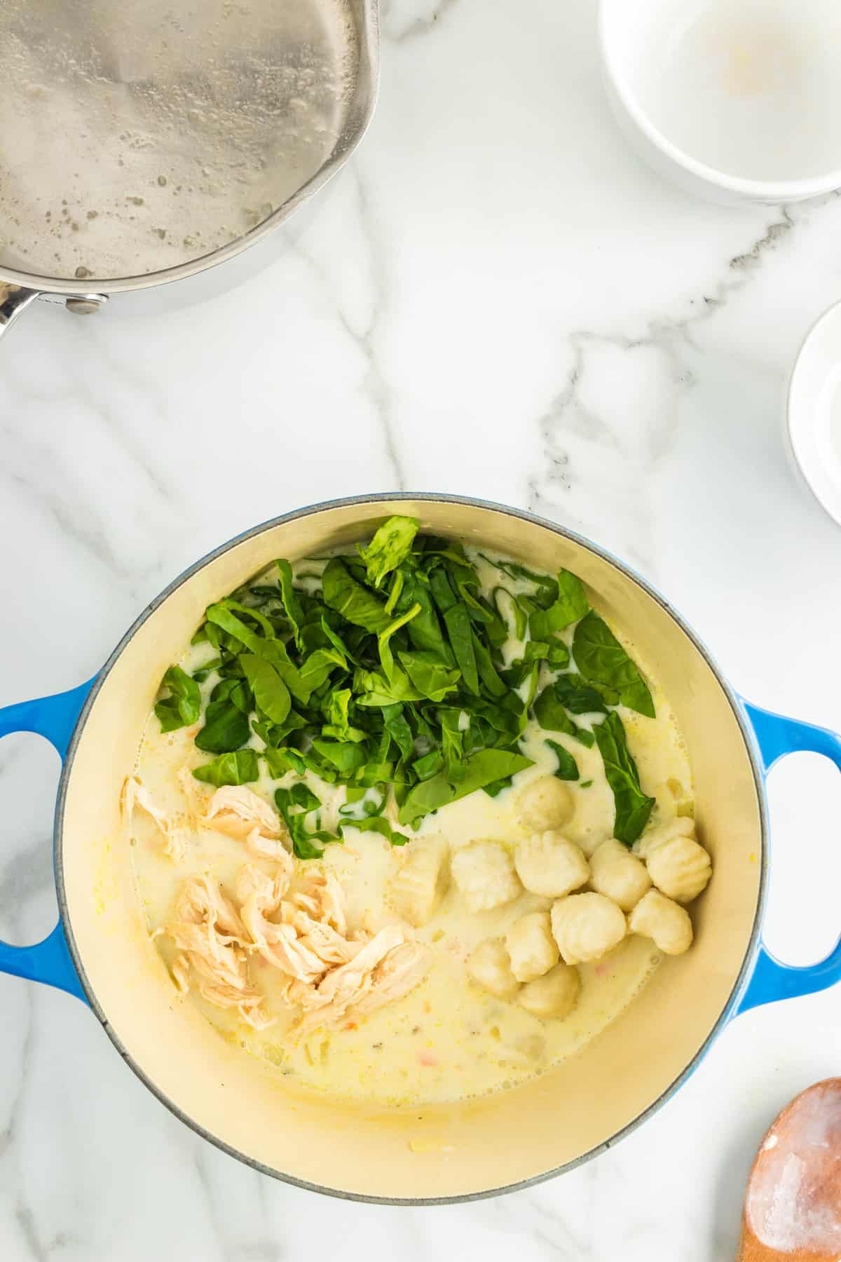 Adding Fresh Spinach, Chicken, and Gnocchi to Chicken and Gnocchi Soup Recipe