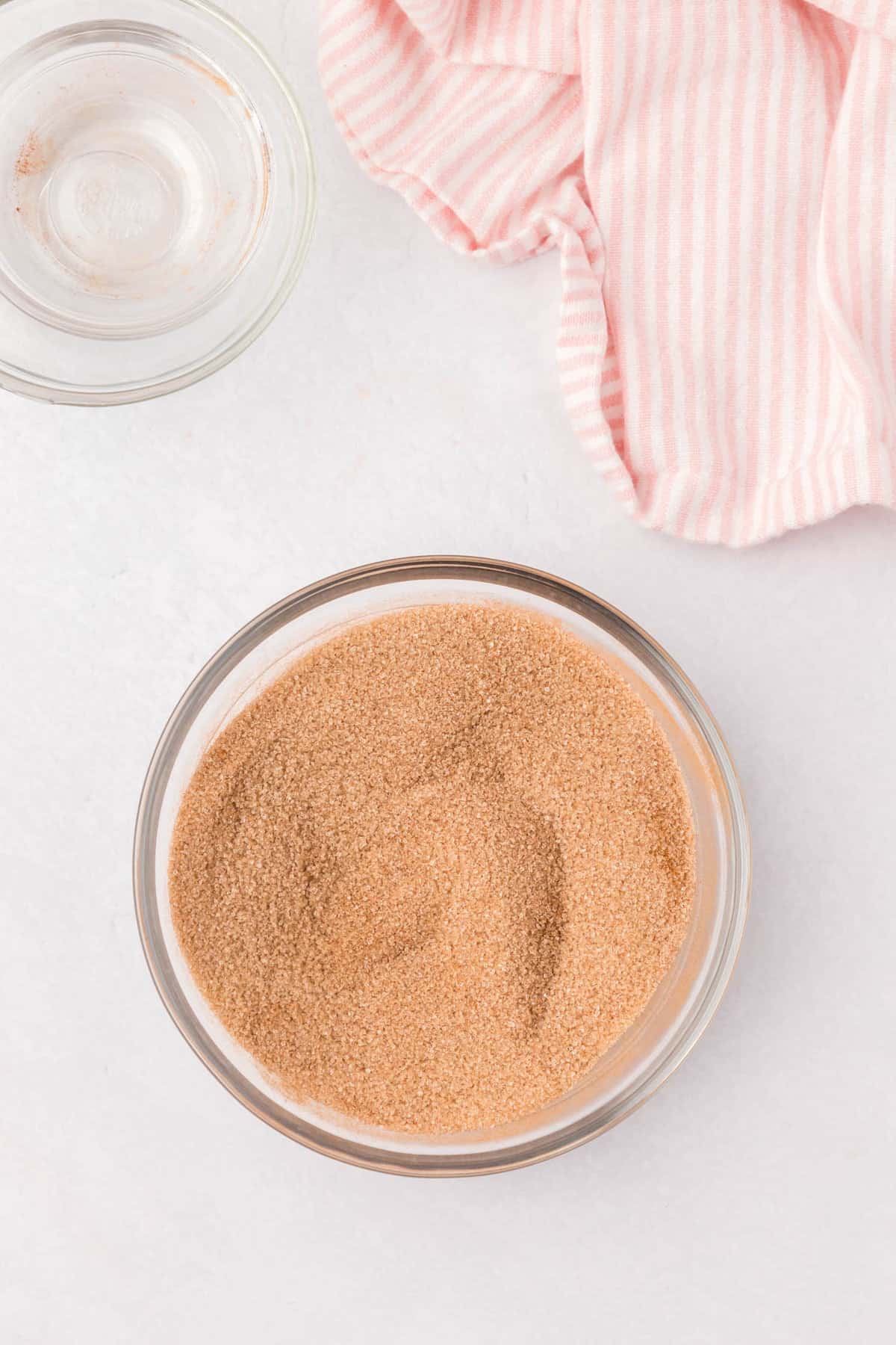 Combined sugar and cinnamon in bowl for Cinnamon Swirl Bread