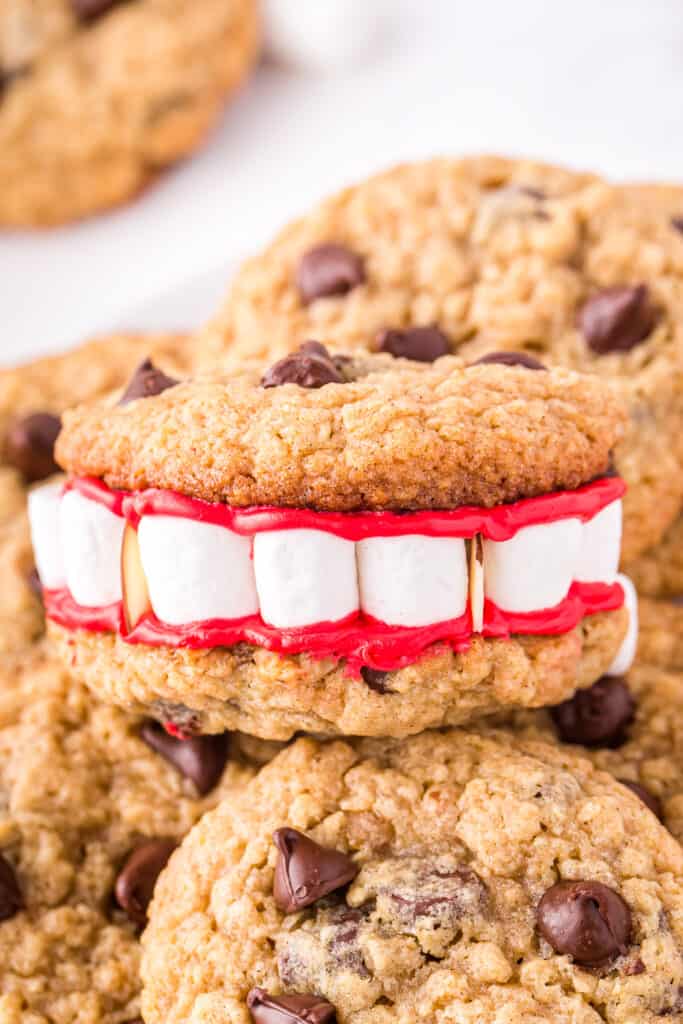 Close up Photo of a Dracula Denture cookie piled on top of one another.