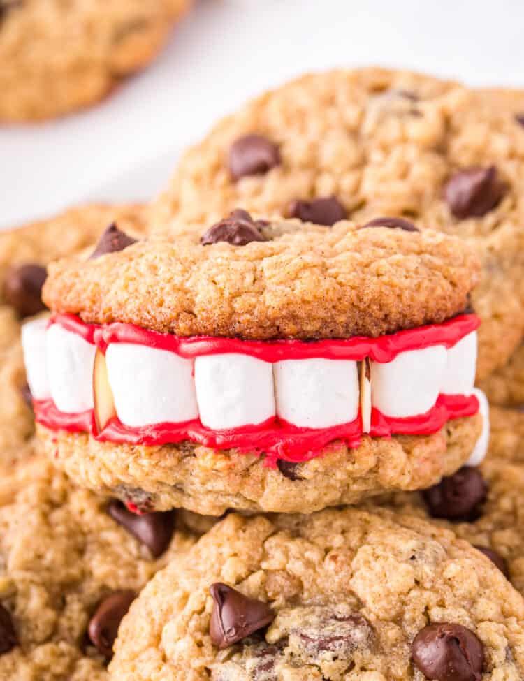 Close up Photo of a Dracula Denture cookie piled on top of one another.