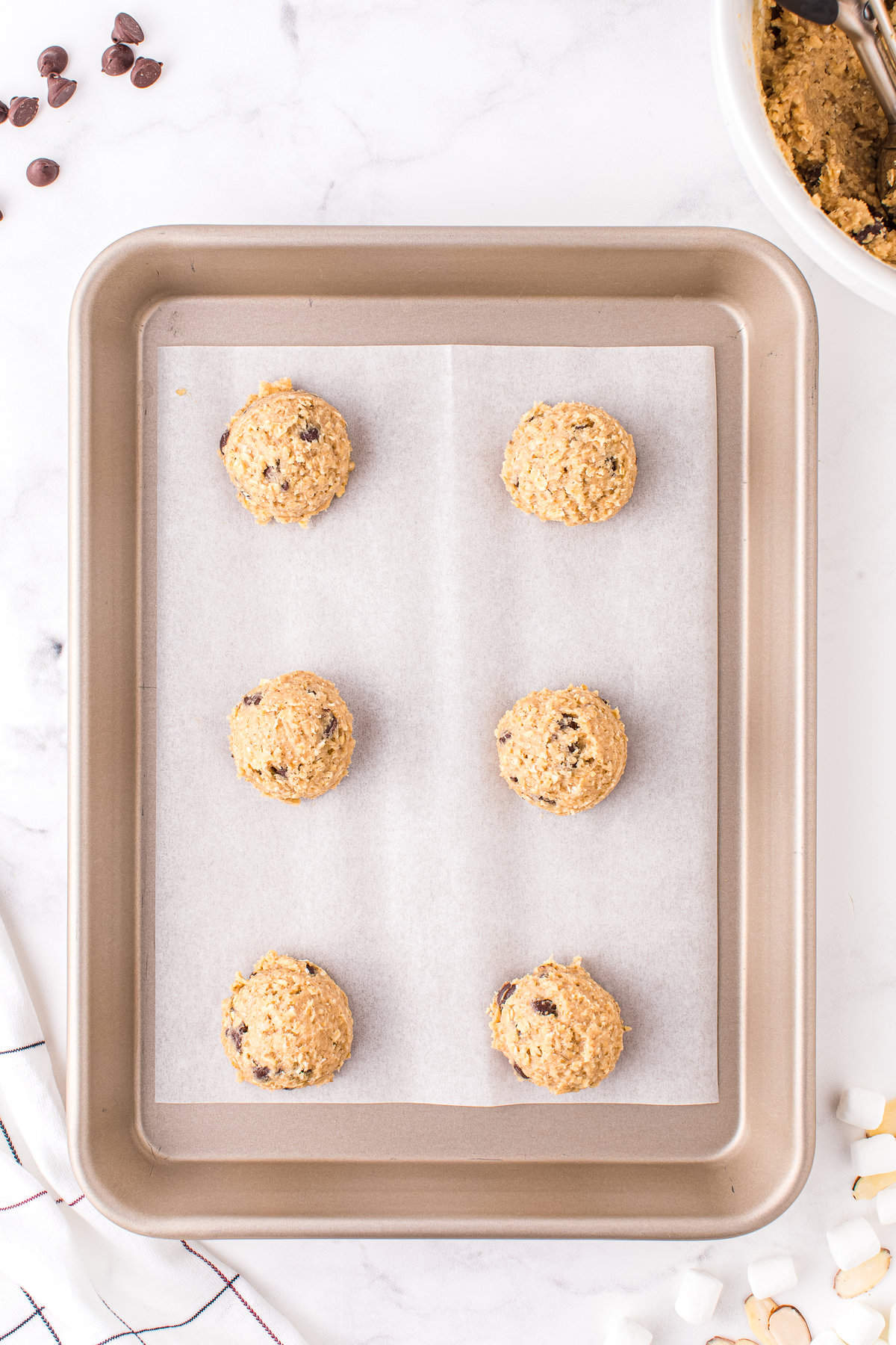 Six cookies ready to go into the oven for 10-12 minutes.