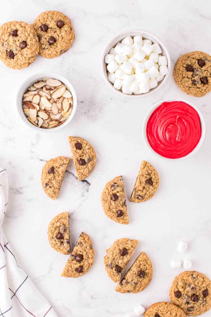 Mix the white frosting and a couple drops of food coloring in a smaller bowl. Make sure its red like blood color.