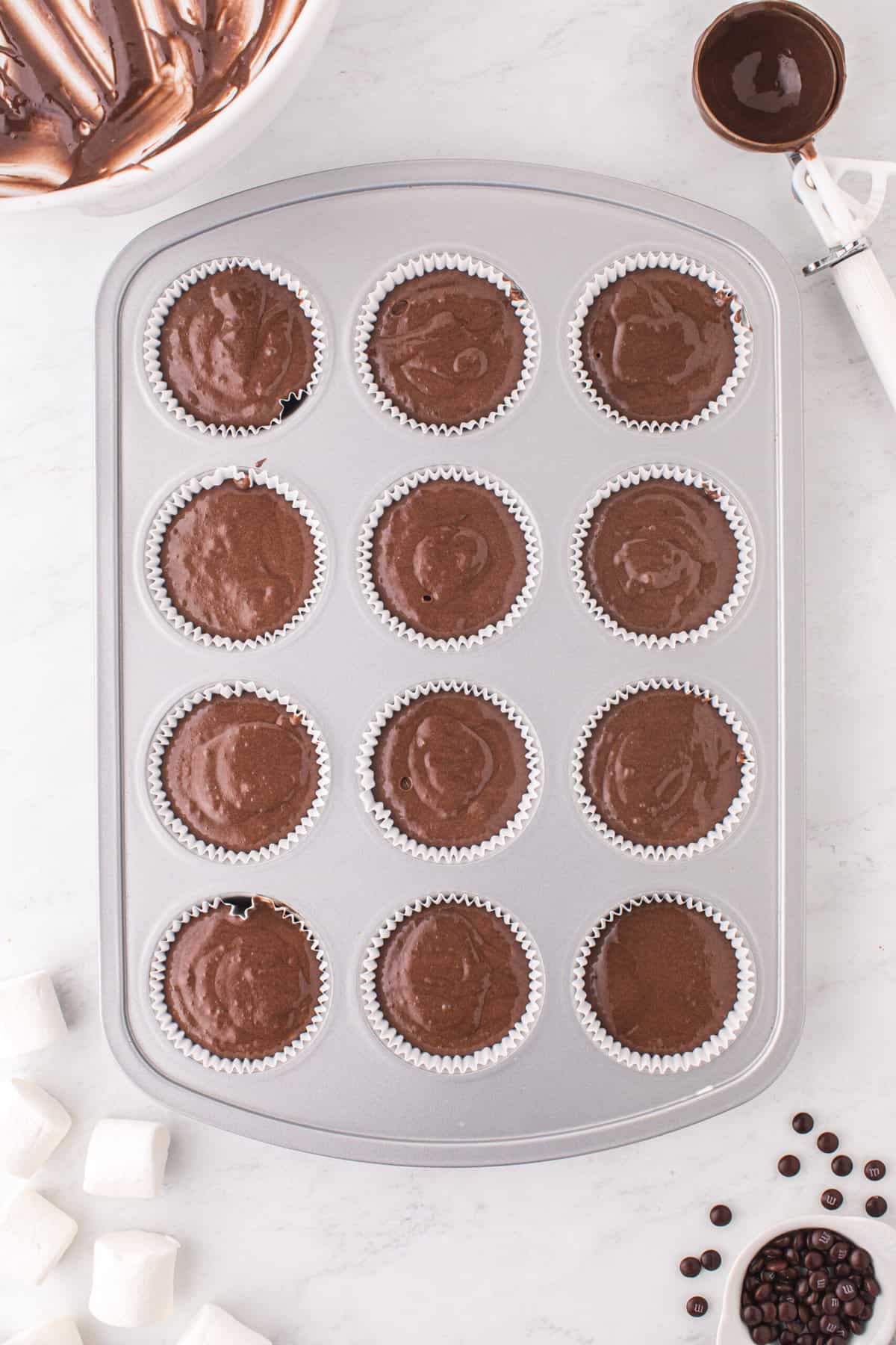 Pour batter into cupcake tin keeping them about 2/3 full.