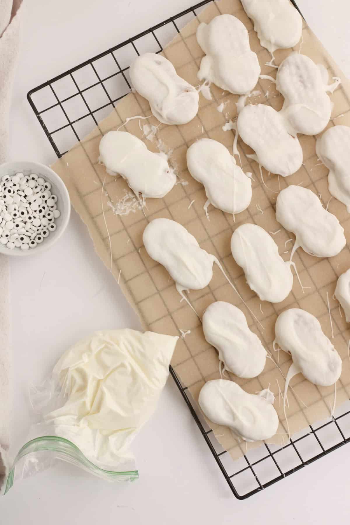 Let it cool and melt the chocolate chips in a microwave safe bowl and pour into a piping bag once completely melted.