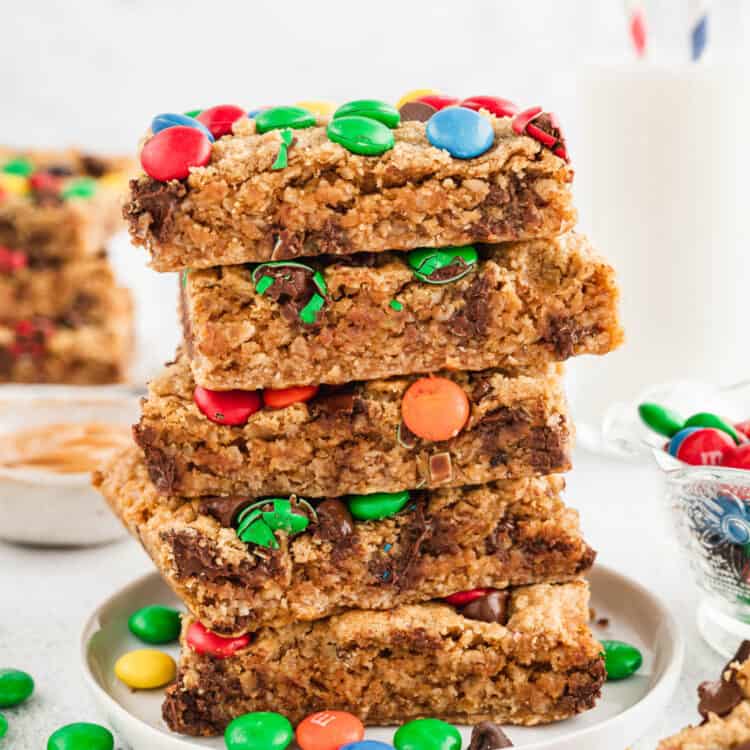 Monster Cookie Bars Cut and Stacked on Plate