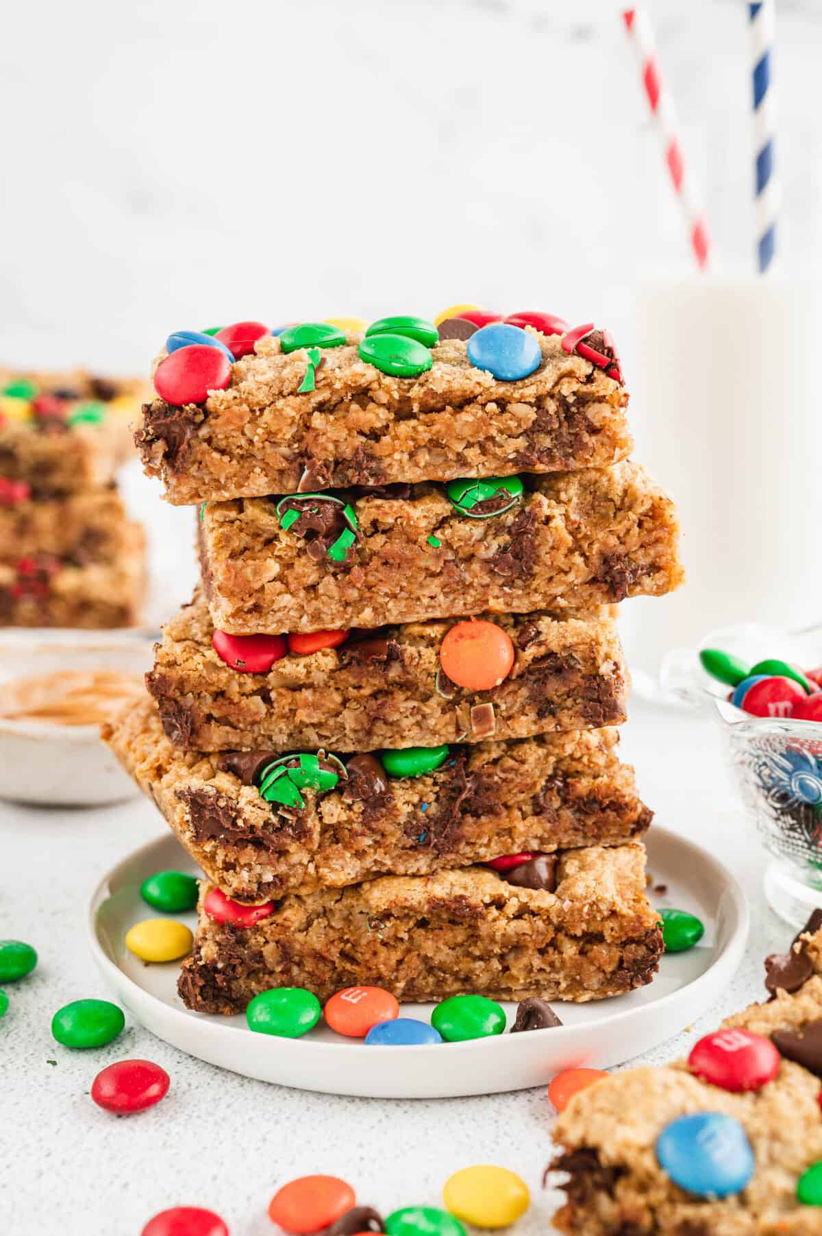 Monster Cookie Bars Cut and Stacked on Plate