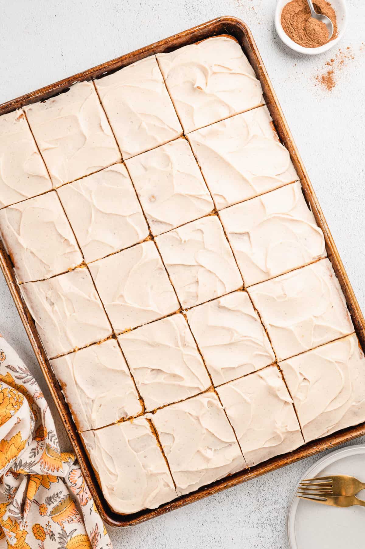 Pumpkin Bars evening cut into squares in baking pan