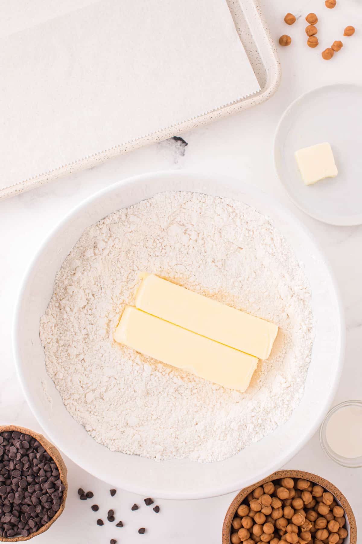 Butter and White Cake Mix in Mixing Bowl for Twix Cookies Recipe