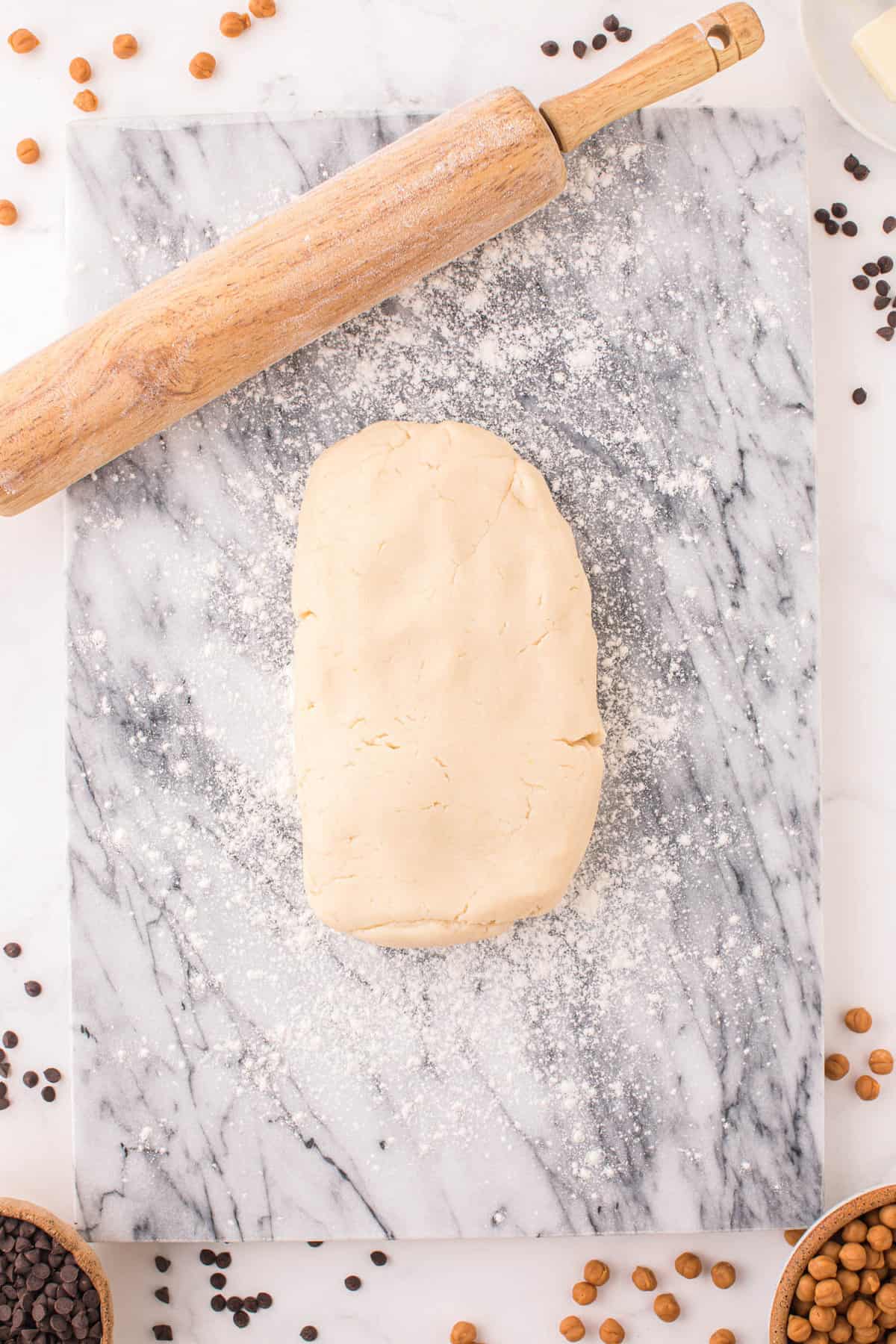 Preparing Cookie Dough on Floured Surface for Rolling