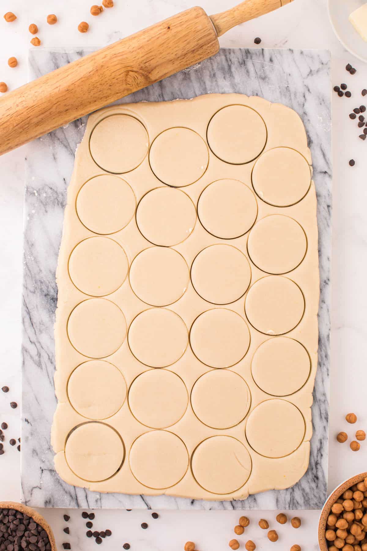 Rolled Cookie Dough With Circled Cookie Cutters for Twix Cookie Recipe