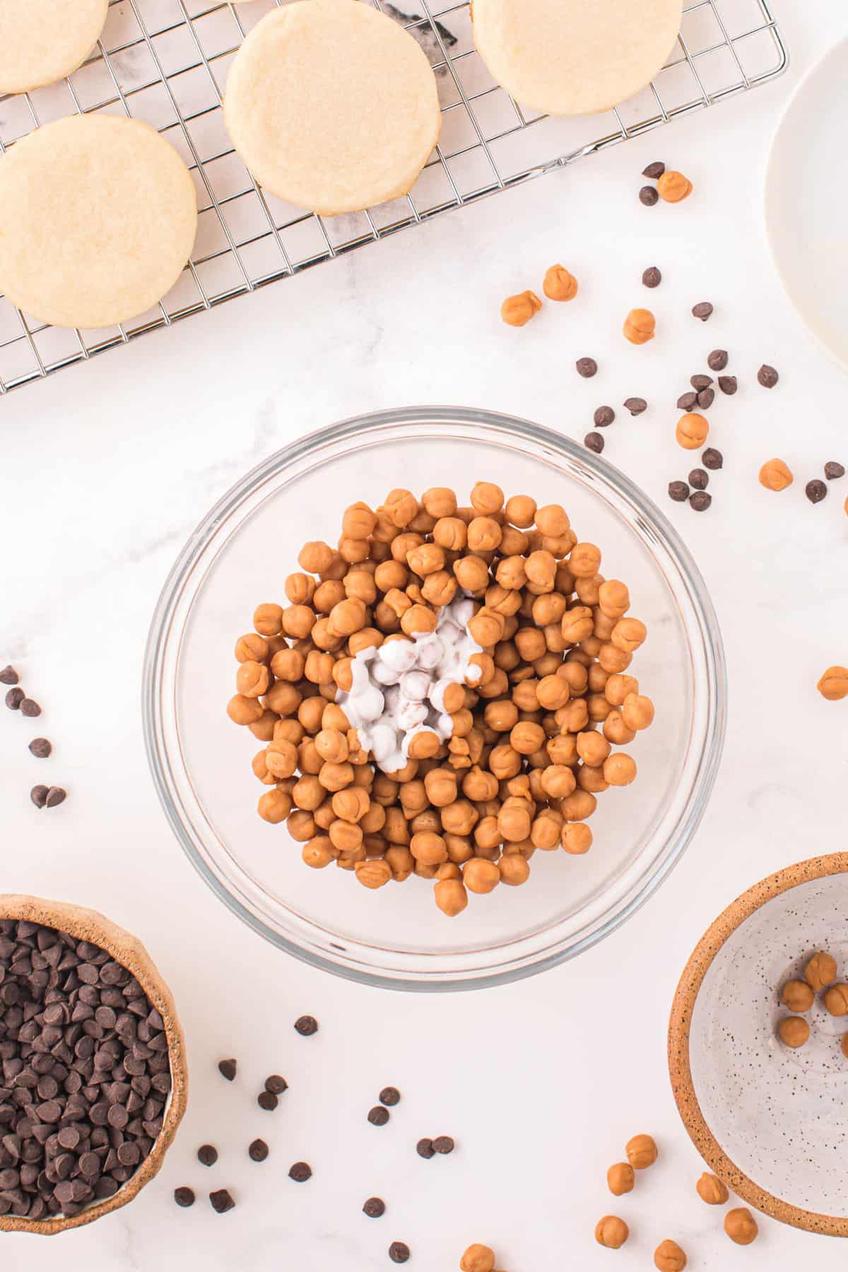 Caramel Bits and Heavy Cream in Bowl for Twix Cookies