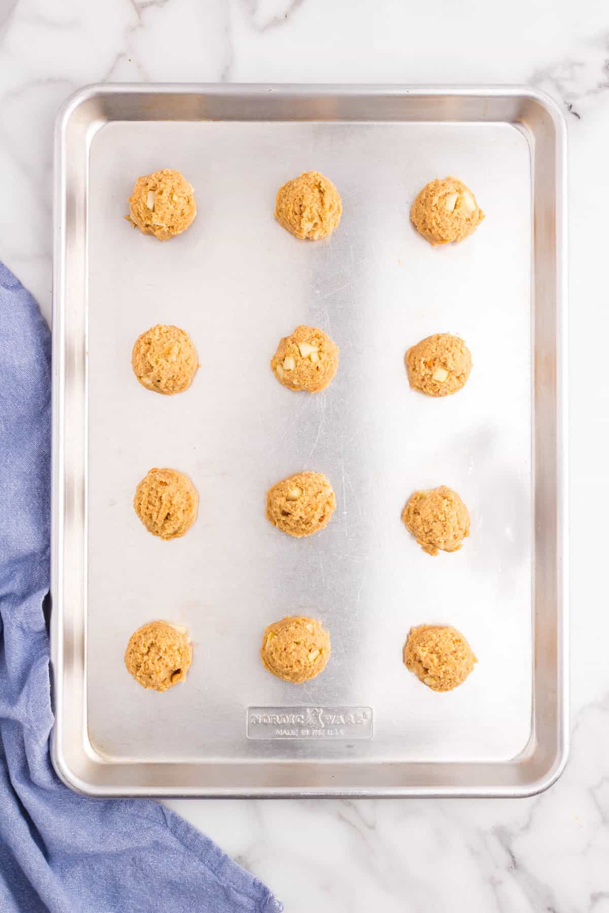 Apple Peanut Butter Cookies dough balls on baking sheet
