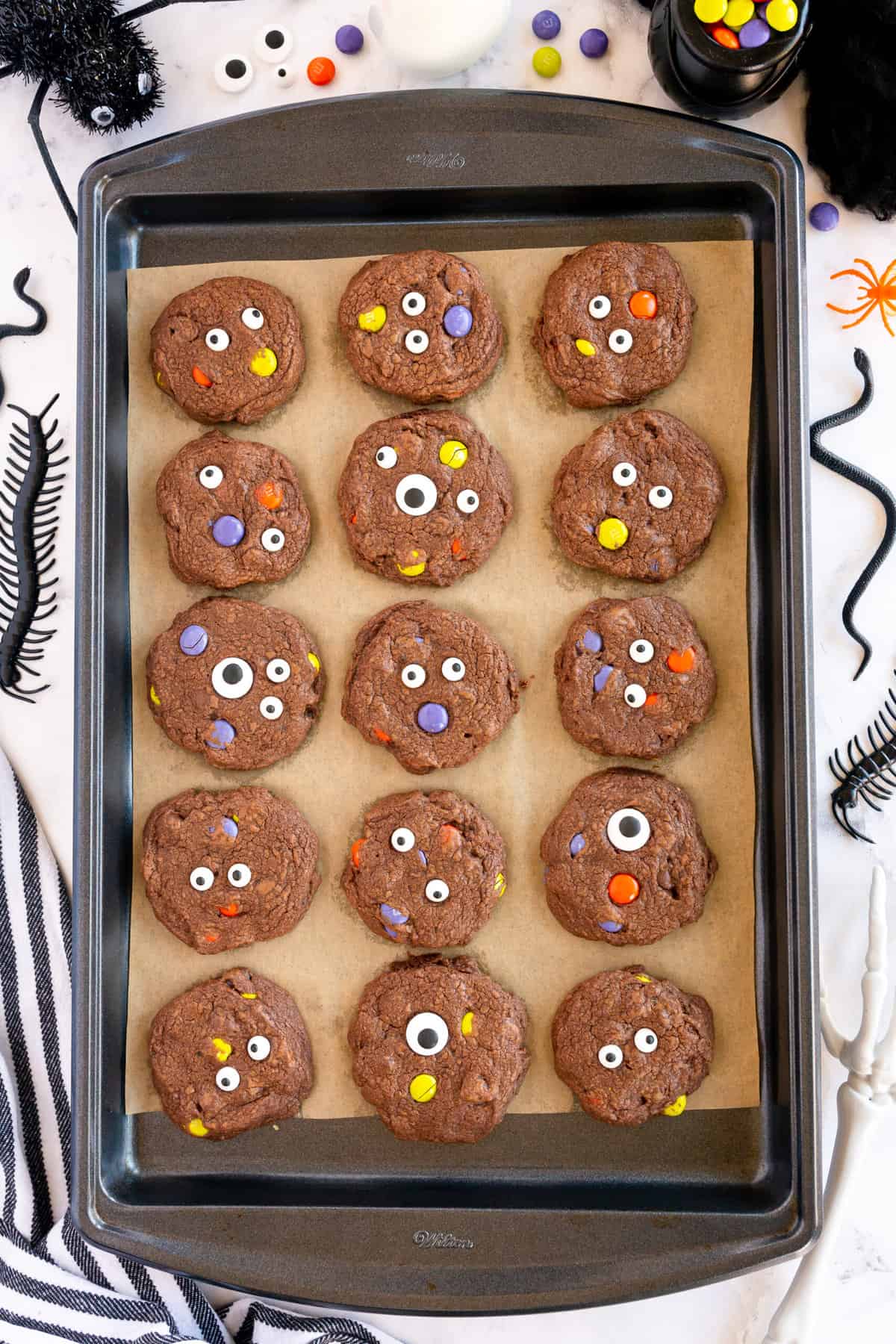 Cookies fully baked on the cookie sheet.