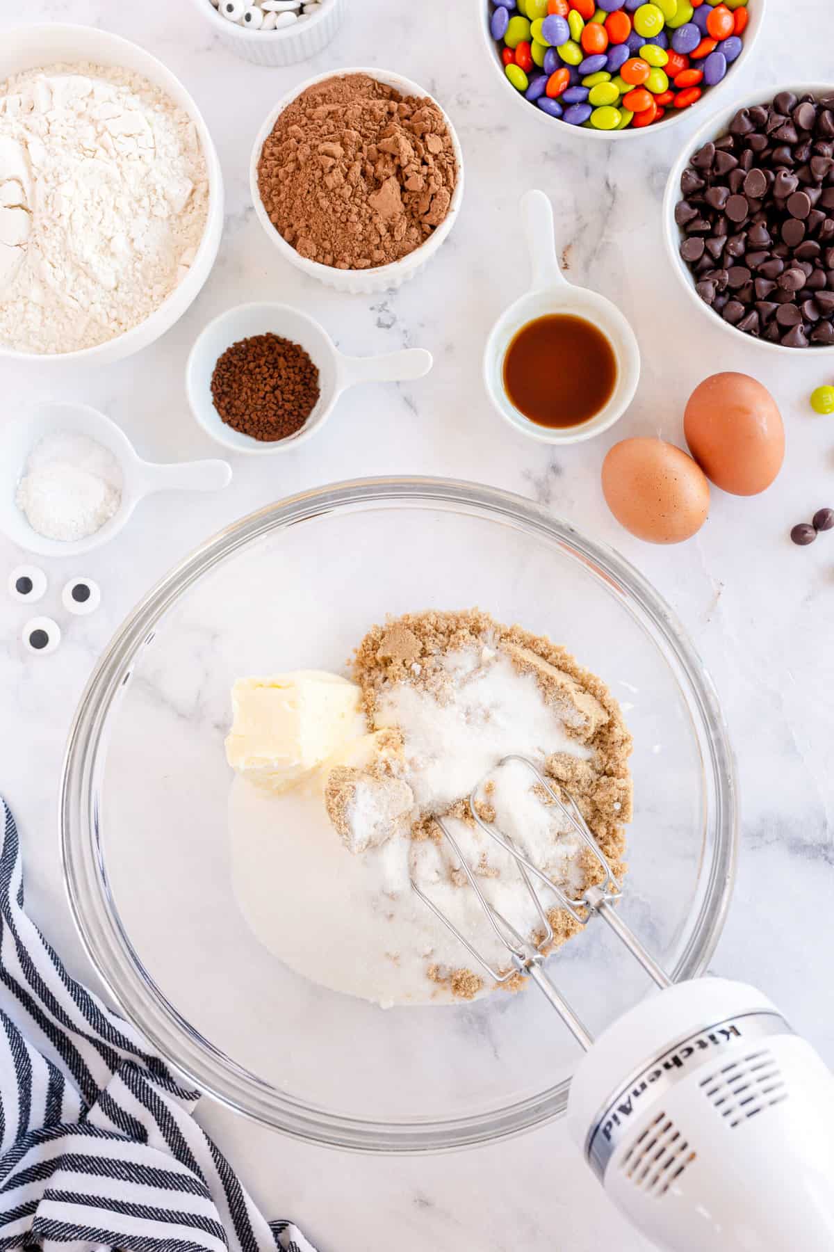 In a Large bowl combine softened butter, brown sugar and white sugar on medium speed until fluffy.