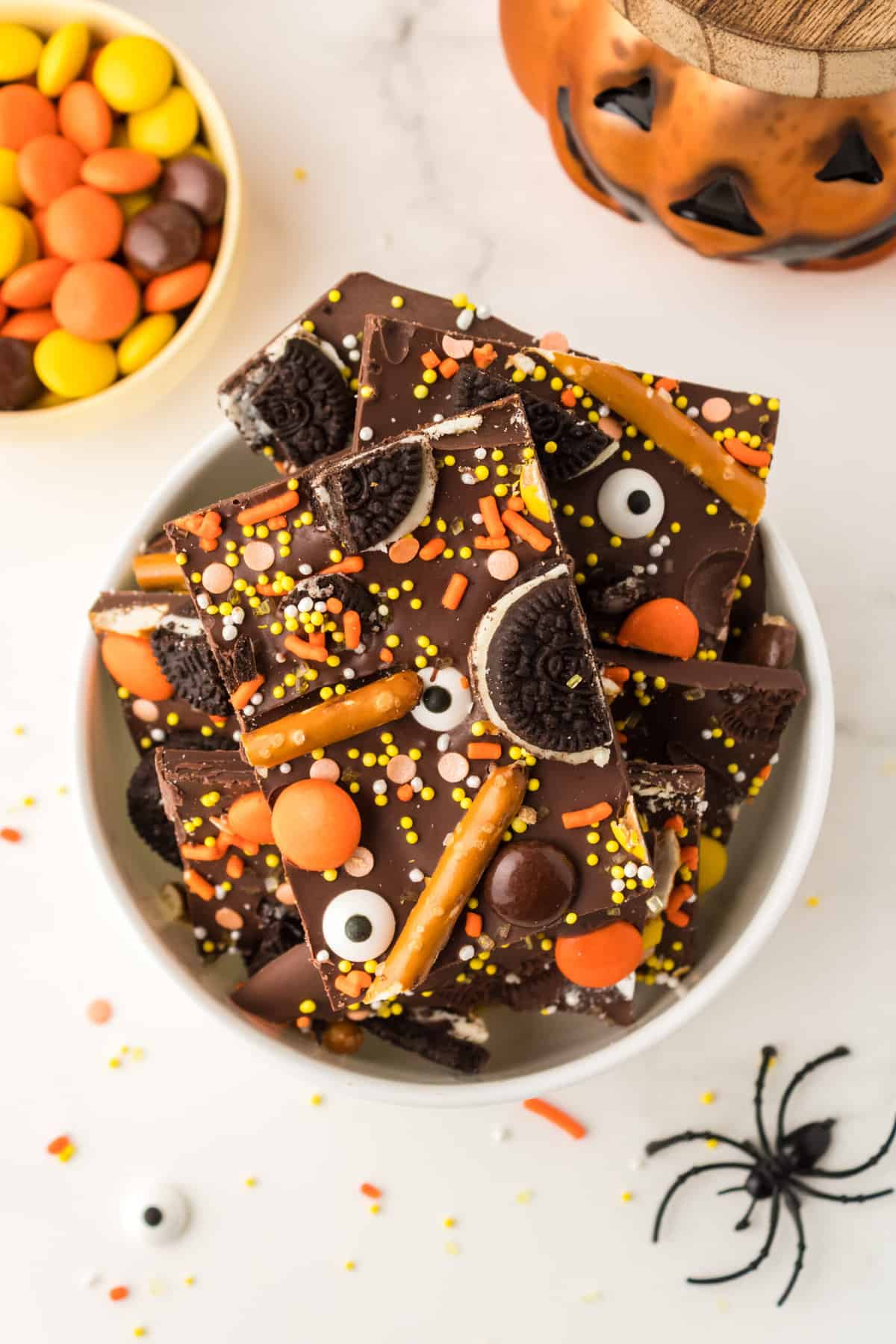 Halloween bark displayed in a white bowl.