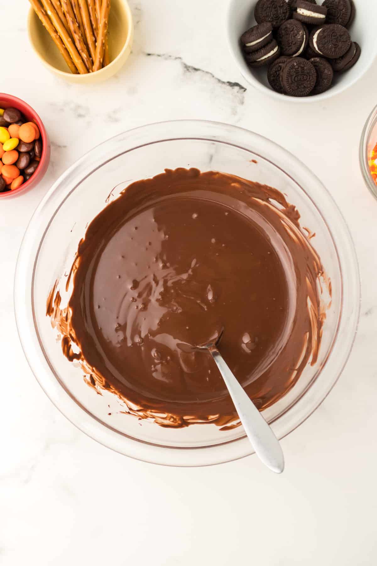 In a Microwave safe bowl, melt the chocolate Wafers Slowly, stirring frequently.