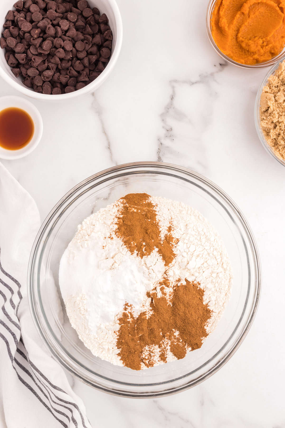 Dry ingredients in mixing bowl for Easy Pumpkin Chocolate Chip Cookies recipe