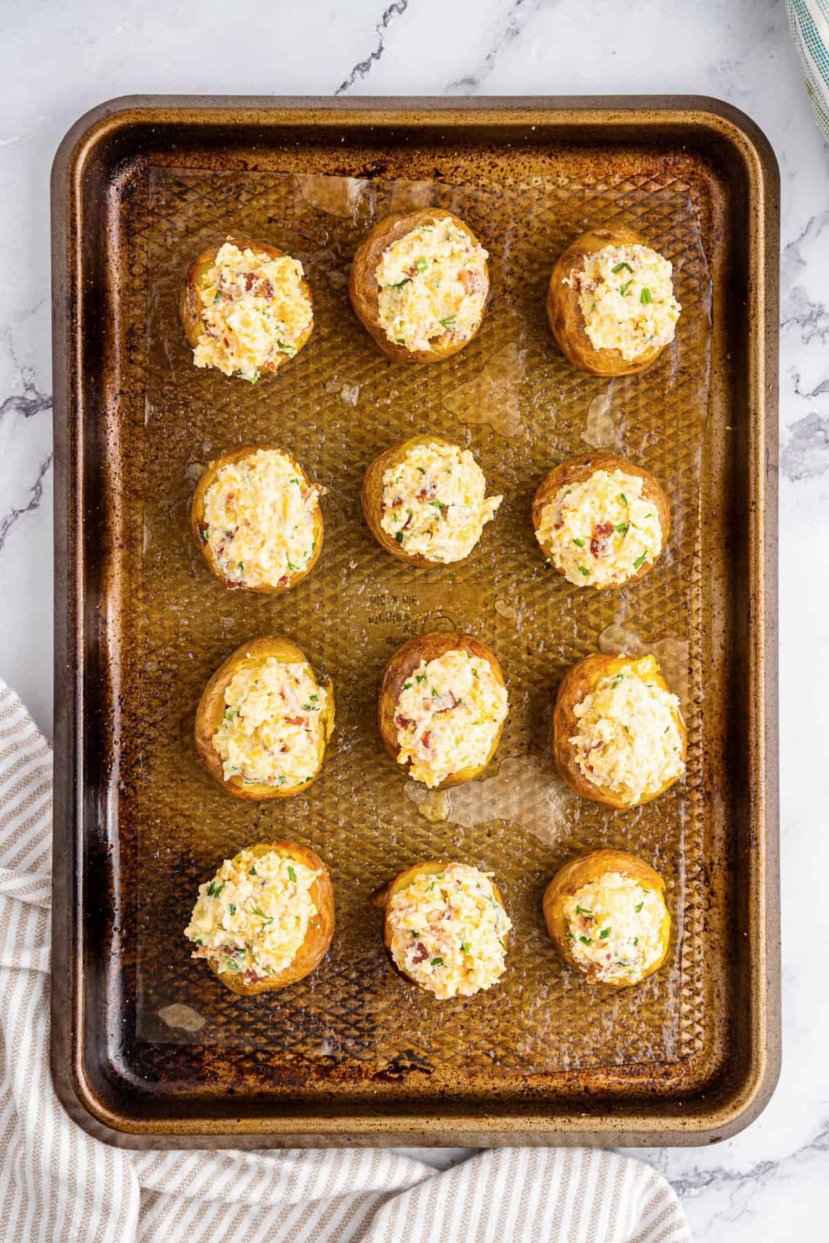 Stuffed baked potato with mixture for Mini Twice Baked Potatoes