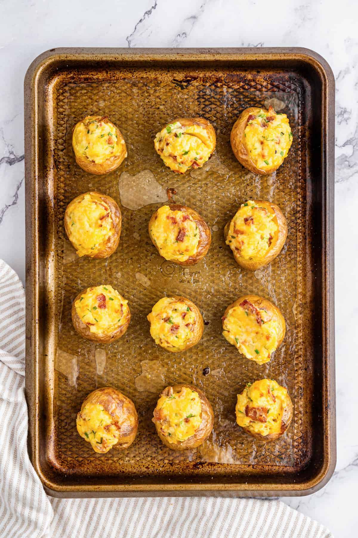 Mini Twice Baked Potatoes on baking sheet