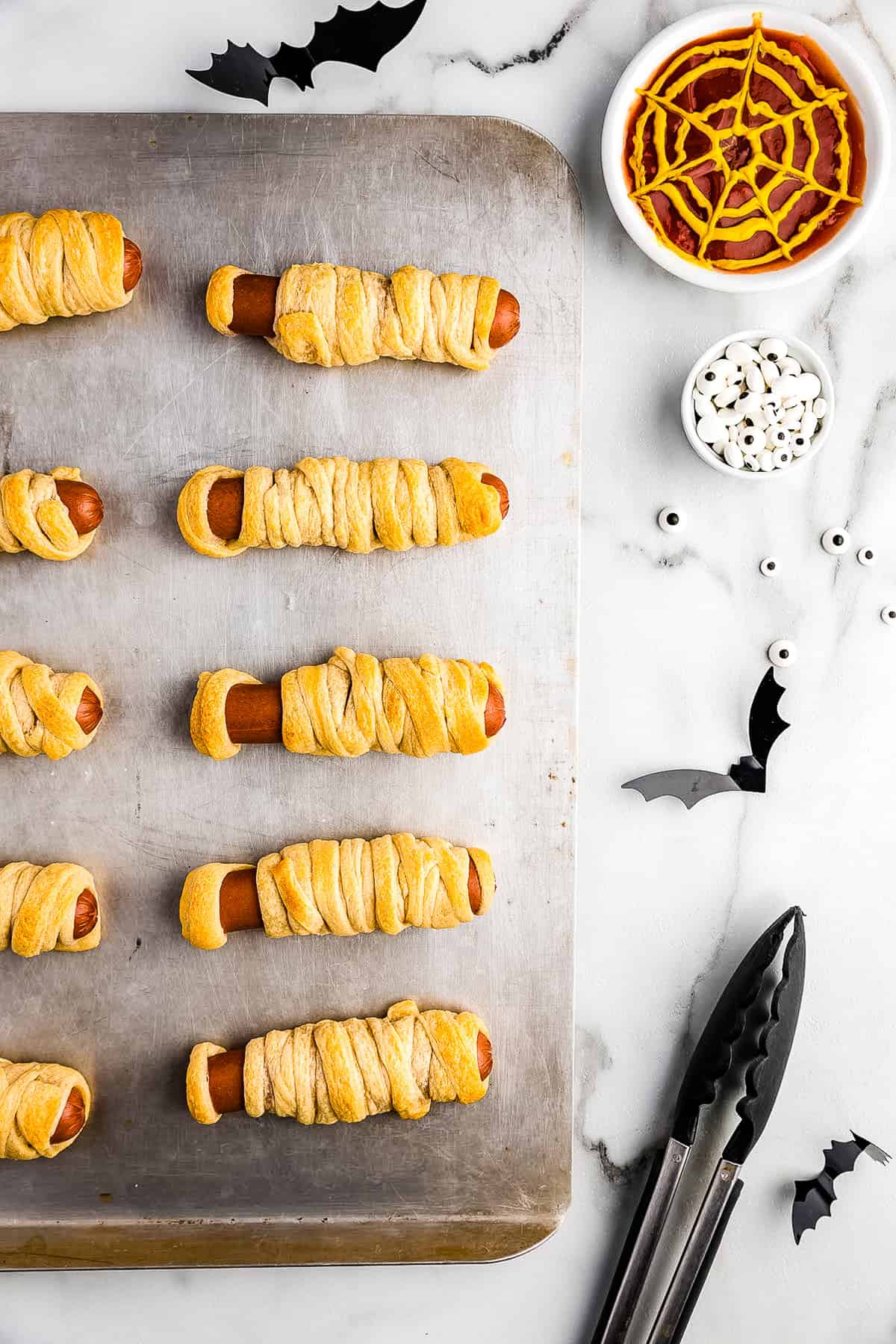 Place the hot dogs on a cookie sheet and bake for 10-12 minutes.