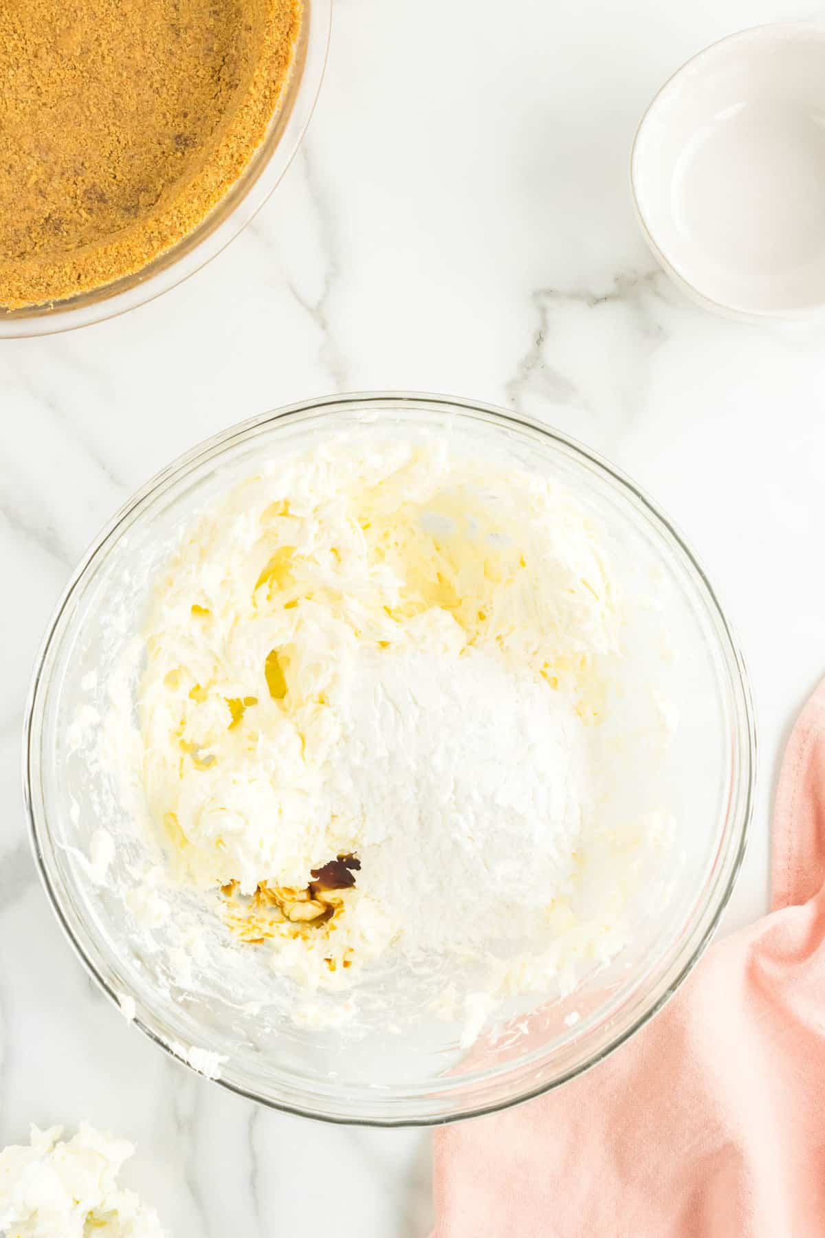 Mixing No Bake Cheesecake Filling in Mixing Bowl