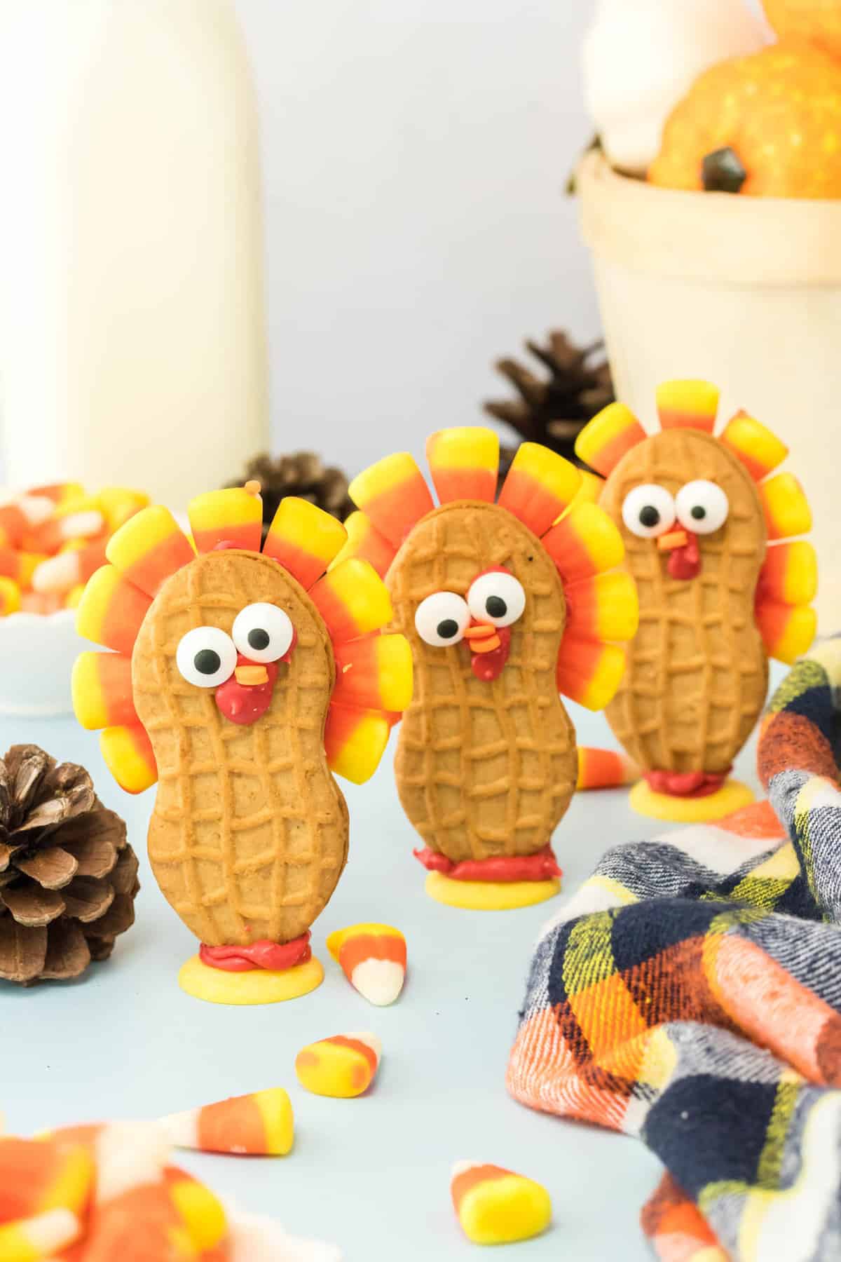 Three Completed Turkey Cookies Standing Behind One Another.