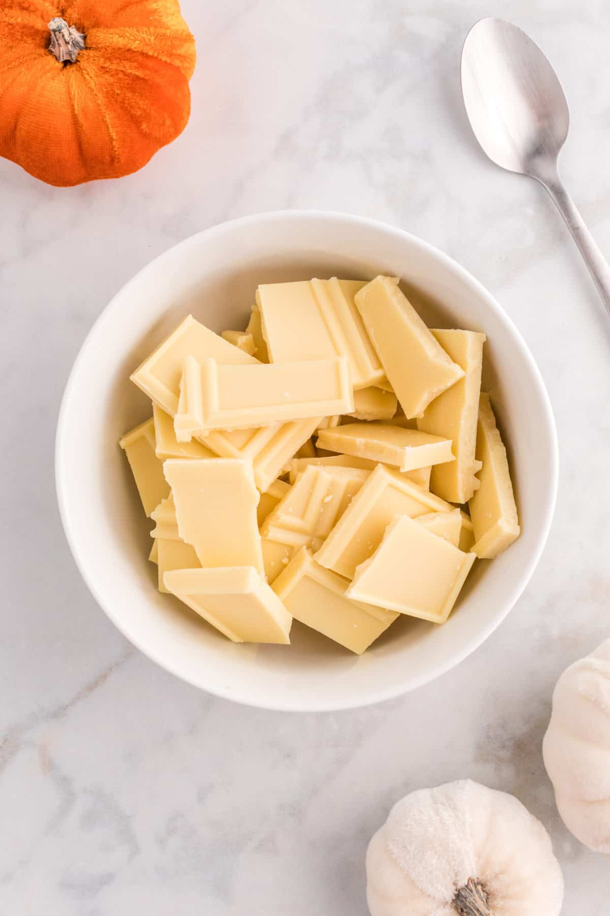 In a Small Microwave Safe bowl melt white chocolate.