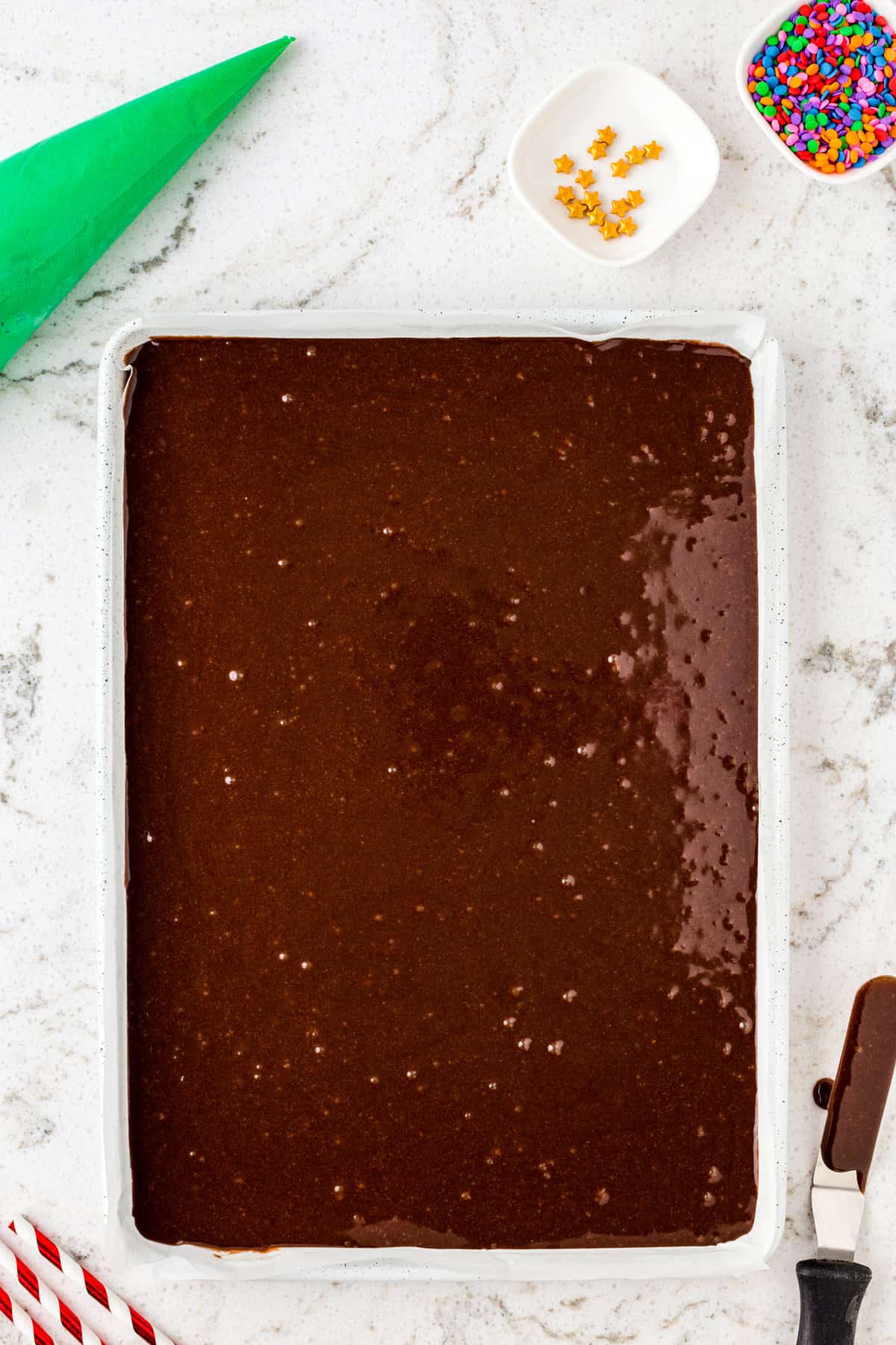 Pour the Brownie Mix into a Jelly Roll Pan lined with Parchment Paper