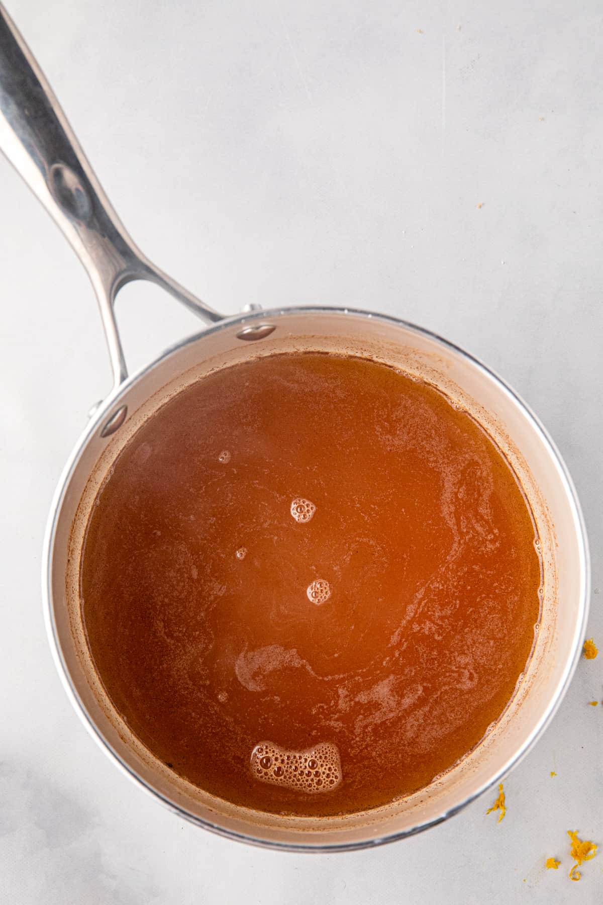 Liquid for cranberry sauce in saucepan