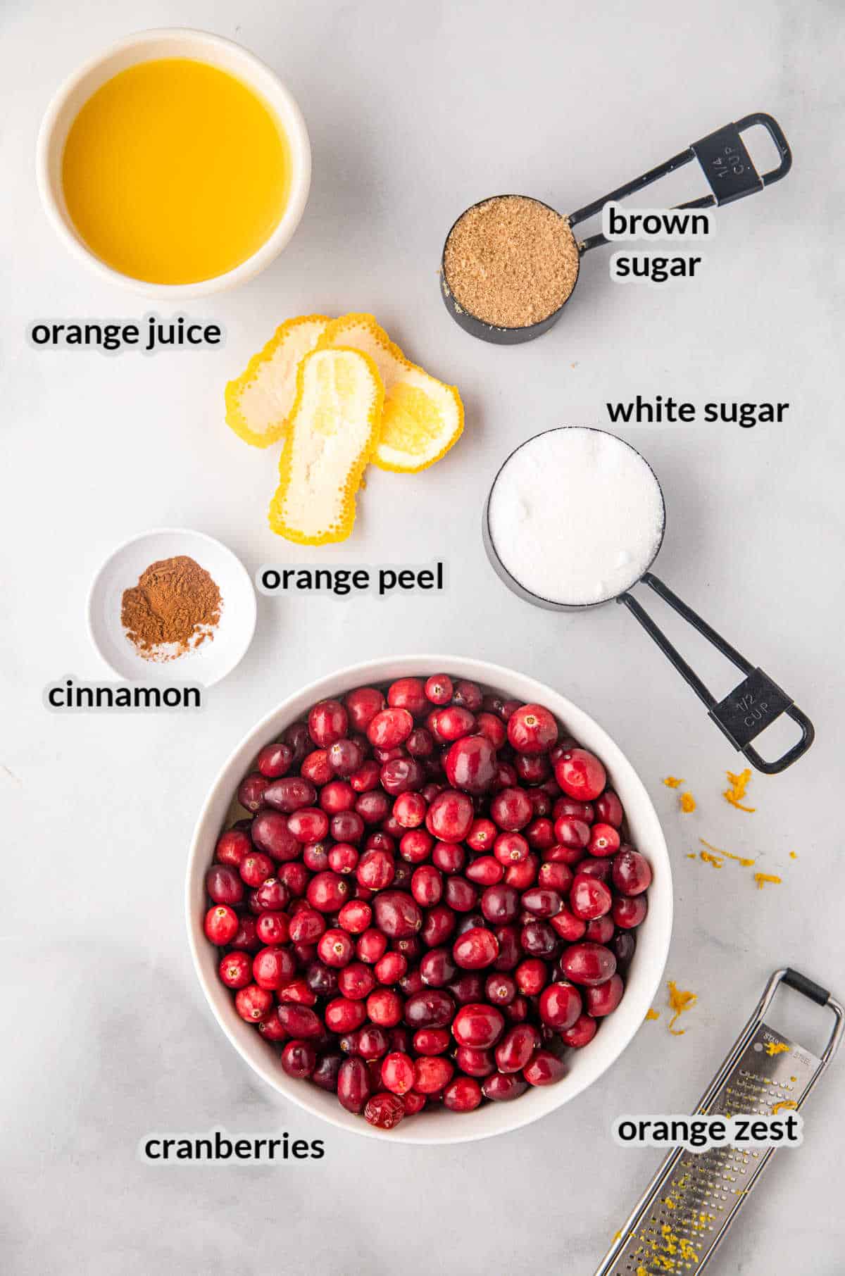 Overhead image of ingredients for cranberry sauce recipe