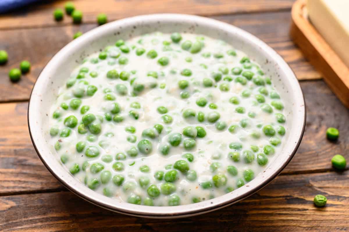 Easy Creamed Peas recipe in serving bowl